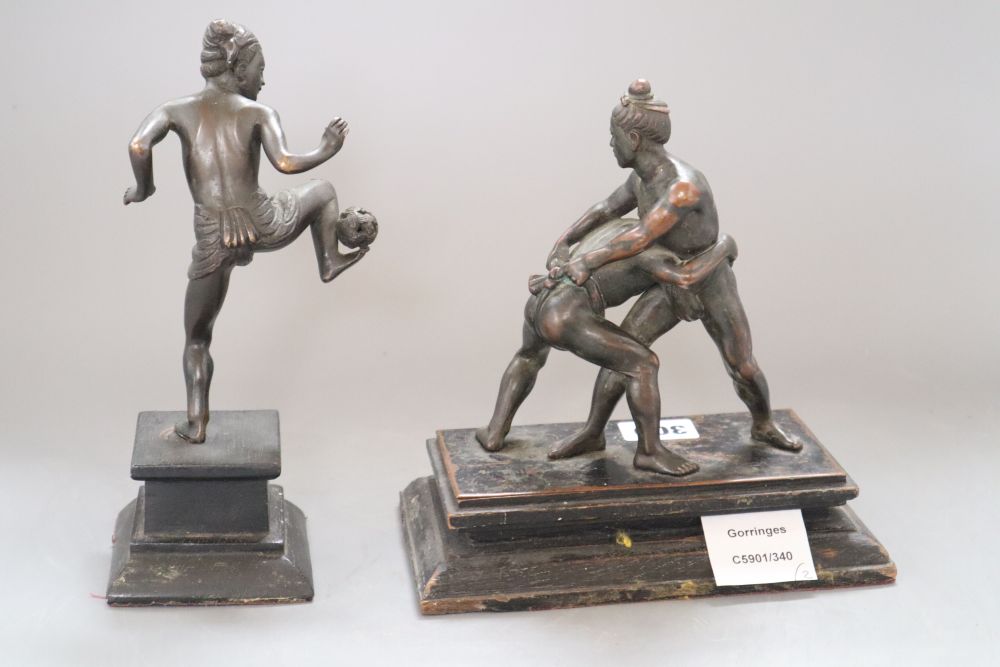 Two Malay bronzes of wrestlers and a juggler, height 21cm